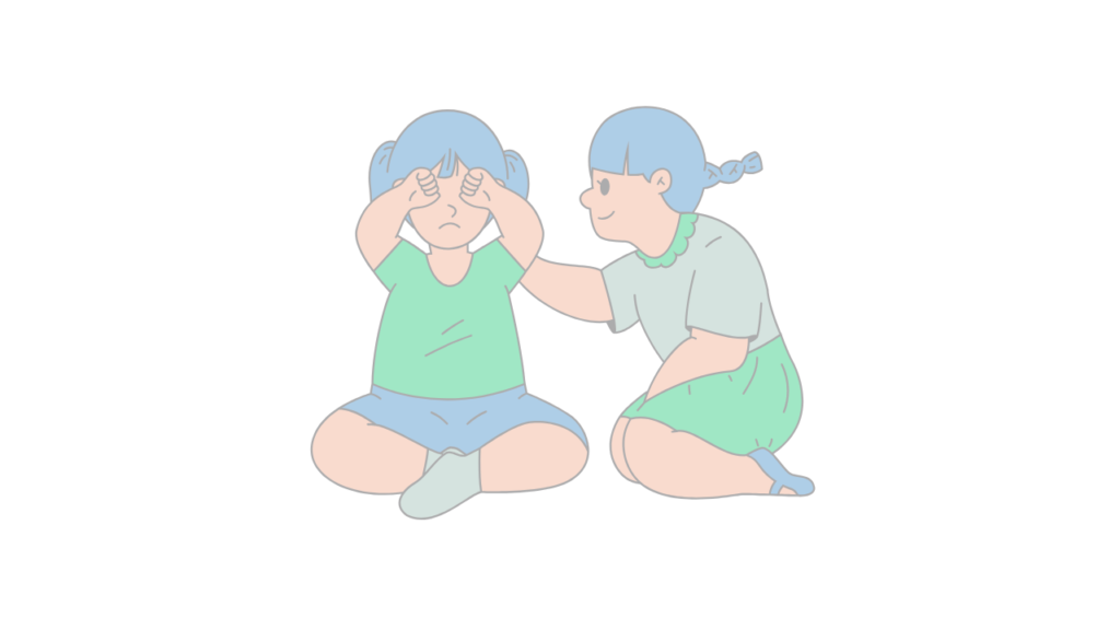 音や光に敏感で目をふさぐ子どもと寄り添う友達